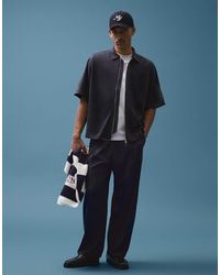 Bershka - Fluid Super baggy Darted Trousers - Lyst