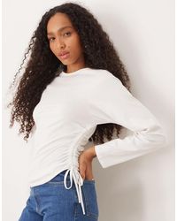 ASOS - T-shirt à manches longues avec fronces nouées sur les côtés - Lyst
