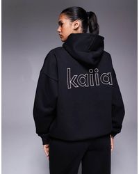 Kaiia - Felpa Con Cappuccio Oversize Nera E Rosa Con Dettaglio Del Logo Sul Retro - Lyst