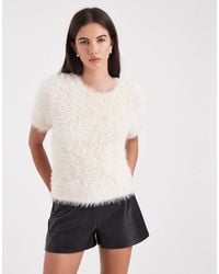 Vero Moda - Pull en maille duveteuse à manches courtes - crème - Lyst
