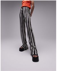 TOPSHOP - Pantaloni a fondo ampio plissé con stampa a righe monocromatiche - Lyst