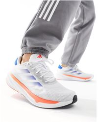 adidas Originals - Adidas running - supernova stride - baskets - et bleu - Lyst