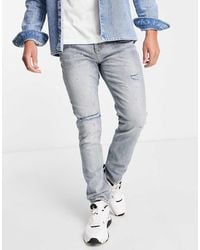River Island - Relaxed Skinny Jeans - Lyst