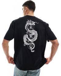 ASOS - T-shirt oversize nera con stampa di dragone sul retro - Lyst