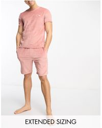 ASOS – pyjama aus geripptem velours - Pink