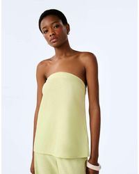 OMNES - Palm Strapless Linen Top - Lyst
