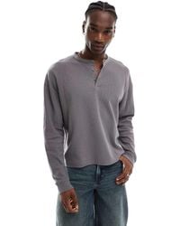 ASOS - Oversized Pigment Dye Long Sleeved T-shirt With Henley Neck - Lyst