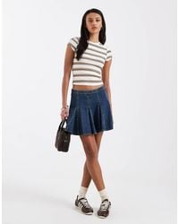 Levi's - Geplooide Denim Mini Rok - Lyst