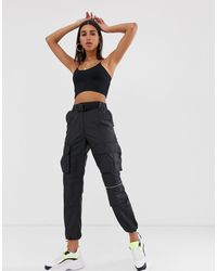 Pantalones, pantalones de vestir y chinos Bershka de mujer desde 15 €