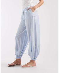 ASOS - Elegante Broek Met Ballonpijpen En Gestrikte Zoom Van Kreukelstof - Lyst