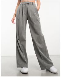 Miss Selfridge - Pantaloni extra larghi a fondo ampio chiaro gessato con fascia estesa sul girovita - Lyst