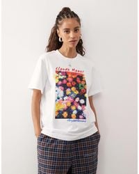 Reclaimed (vintage) - Oversized T-shirt With Licensed Monet Flower Print - Lyst