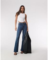 GOOD AMERICAN - Good Legs Flare Jeans - Lyst