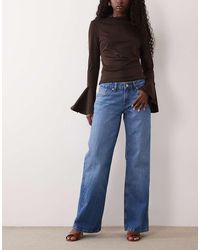 GOOD AMERICAN - Good Waist Low Rise Loose Jeans - Lyst