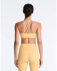 Oysho - Comfortlux Light Support Sports Bra With Crossover Straps - Lyst