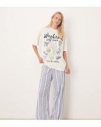 ASOS - Pijama De Camiseta Extragrande Y Pantalones De Pernera Ancha Con Gráfico "Weekend Self Care" De Asos Design Tall - Lyst