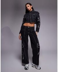 Liquor N Poker - Relaxed Low Rise Jeans With Applique Detail - Lyst