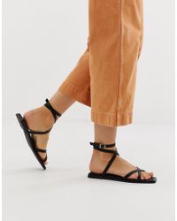 ASOS Sandalias con tiras en negro Foresight