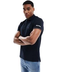 Tommy Hilfiger - Smal Poloshirt Met Een Gekleurd Randje - Lyst