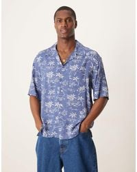 GANT - Chemise manches courtes avec col à revers et imprimé island logo - moyen - Lyst