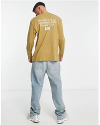 Lee Jeans - Top ample à manches longues avec logo imprimé au centre et dans le dos - fauve - Lyst