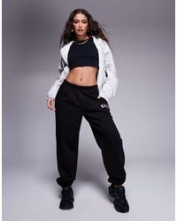Kaiia - Petite Cotton Blend Embroidered Logo Cuffed joggers - Lyst