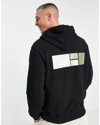 Calvin Klein - Sudadera negra con capucha y estampado fotográfico - Lyst