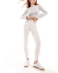 ONLY - Vaqueros De Corte Pitillo Con Bajos Deshilachados Blush De -Blanco - Lyst