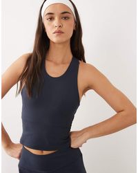 4505 - Icon Racer Back Vest With Inner Bra And Removable Padding - Lyst