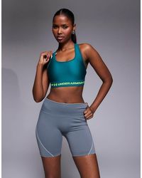 Under Armour - Crossback Mid Sports Bra - Lyst