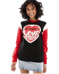 Love Moschino - – es sweatshirt mit blockfarbendesign, logo und rundhalsausschnitt - Lyst