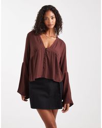 Miss Selfridge - Flare Sleeve Button Up Peplum Blouse - Lyst