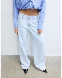 Stradivarius - Low-Rise Double-Button Jeans - Lyst