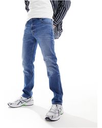 Lee Jeans - Rider - jean slim - bleu foncé vintage délavé - Lyst