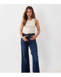 Good American Petite - Soft Tech Good Waist Palazzo Jeans - Lyst