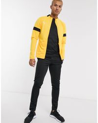 Puma black and yellow tracksuit Clearance