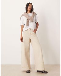 Calvin Klein - Pantalon chino ultra ample - beige - Lyst