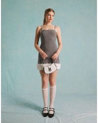 Miss Selfridge - Bow Detail Ruffle Hem Corset Mini Dress - Lyst