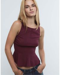 Stradivarius - Top Senza Maniche A Peplo - Lyst