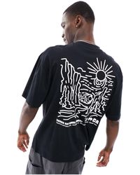 ASOS - Camiseta negra extragrande con estampado escénico en la espalda - Lyst