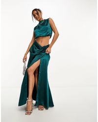 In The Style - Exclusivité - jupe longue d'ensemble torsadée sur le devant en tissu satiné - bleu sarcelle - Lyst