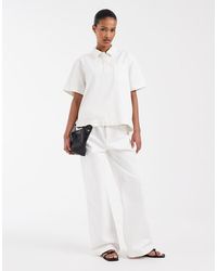 Lacoste - Paper Bag Straight Leg Jeans - Lyst