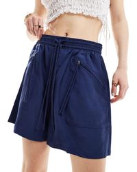 & Other Stories - Pantalones cortos es con cintura elástica y bolsillos con cremallera - Lyst