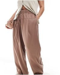 ASOS - Asos Design Curve Oversized Pull On Trousers With Panel And Pleat Detail - Lyst