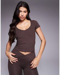 4505 - Icon V Neck Performance Baby T-shirt - Lyst