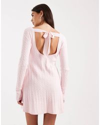 Hollister - Robe pull coupe babydoll courte avec liens au dos - rose - Lyst