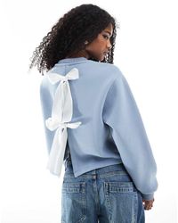 Miss Selfridge - Felpa Con Fiocchi A Contrasto Sul Retro - Lyst