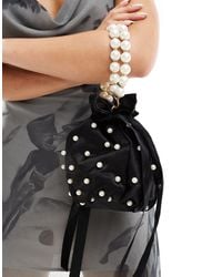 True Decadence - Embellished Pouch Bag With Pearl Handle - Lyst