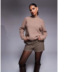 Aria Cove - Geribbelde Gebreide Hoogsluitende Trui - Lyst