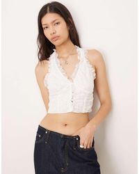 Collective The Label - Fitted Lace Top With Ruffle Trim - Lyst